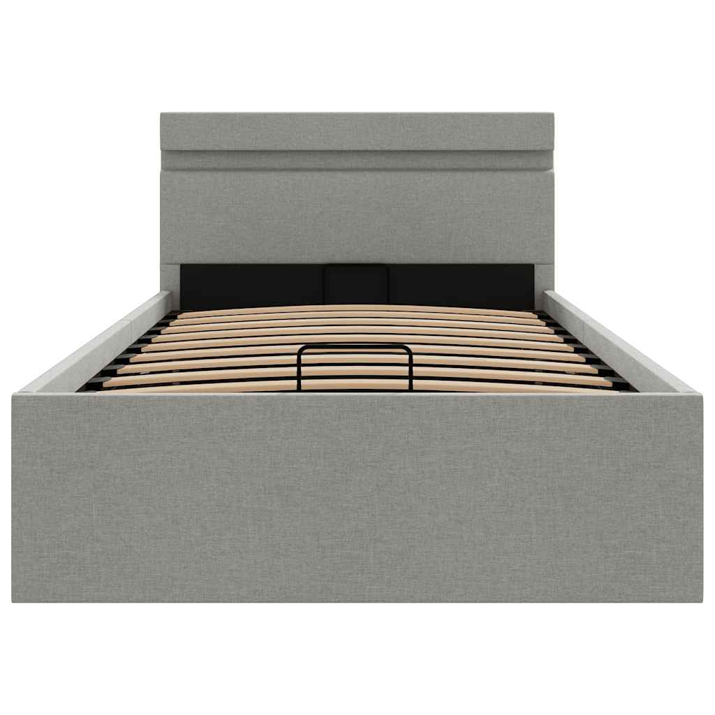 hydraulisk opbevaringsseng med LED 90x200 cm stof lysegrå