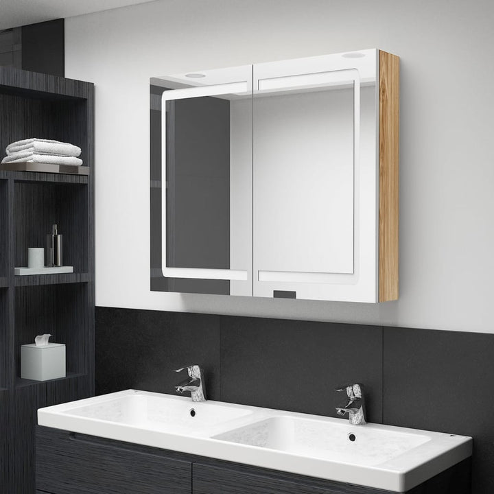 badeværelsesskab med spejl + LED-lys 80x12x68 cm egetræ og hvid