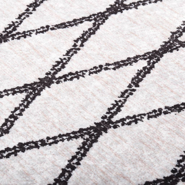 gulvtæppe 160x230 cm vaskbart sort og hvid