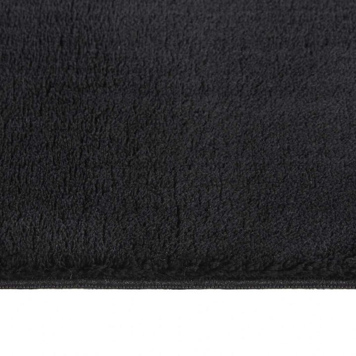 gulvtæppe 160x230 cm blødt plys skridsikkert og vaskbart sort