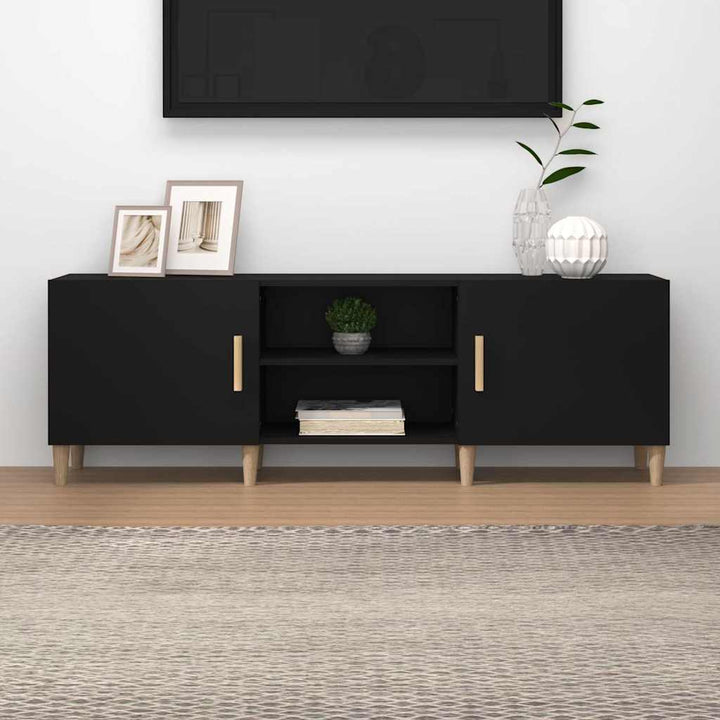 tv-bord 150x30x50 cm konstrueret træ sort