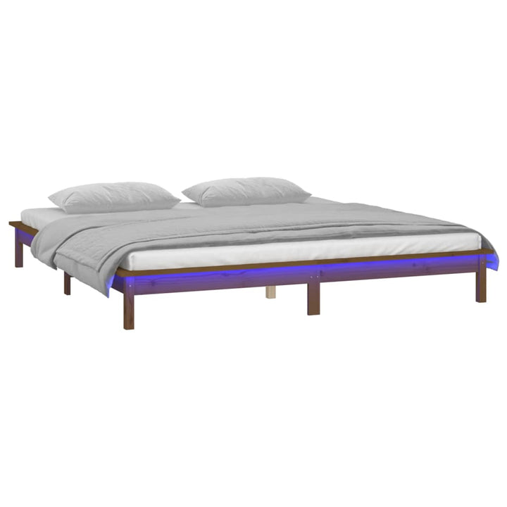 sengeramme med LED-lys 140x200 cm massivt træ gyldenbrun