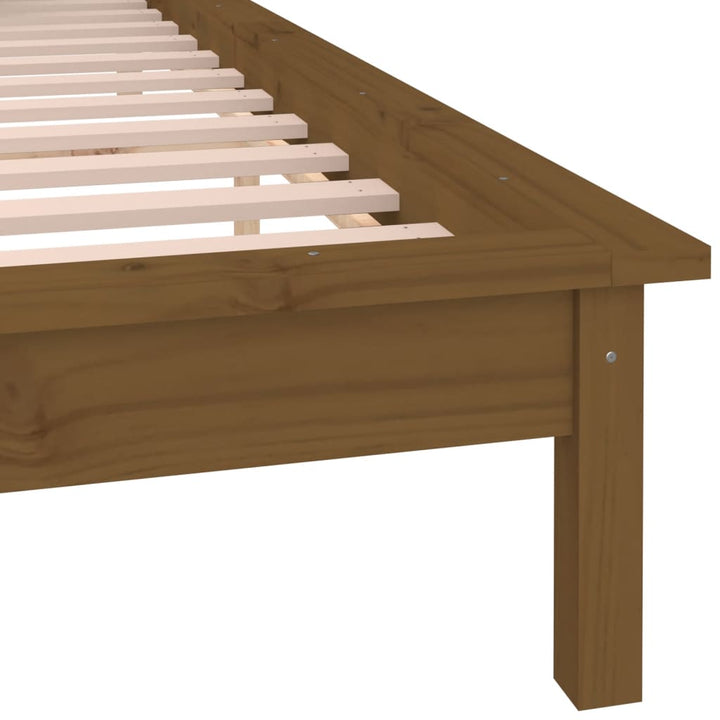 sengeramme med LED-lys 140x200 cm massivt træ gyldenbrun