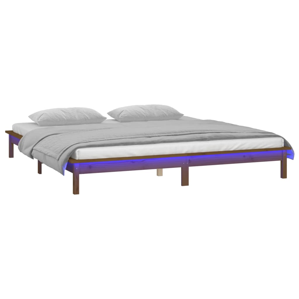 sengeramme med LED-lys 140x190 cm massivt træ gyldenbrun