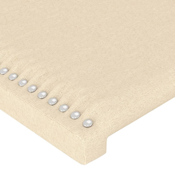 sengegavl med kanter 147x16x118/128 cm stof cremefarvet