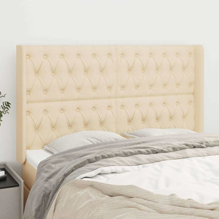 sengegavl med kanter 147x16x118/128 cm stof cremefarvet