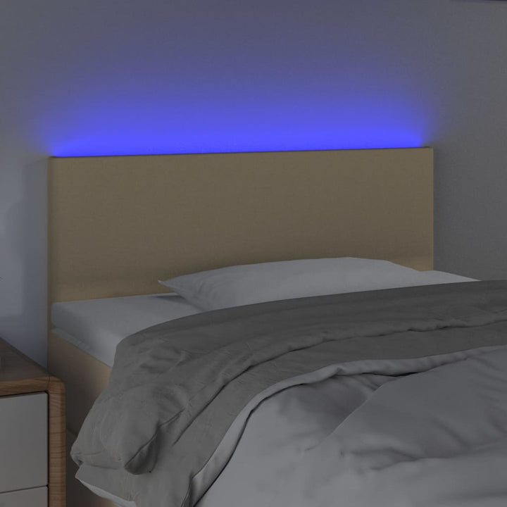sengegavl med LED-lys 90x5x78/88 cm stof cremefarvet