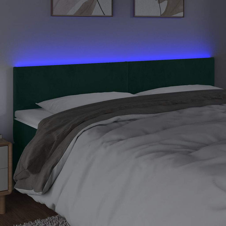 sengegavl med LED-lys 180x5x78/88 cm fløjl mørkegrøn