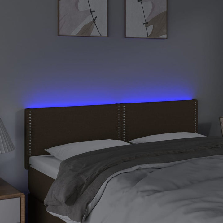 sengegavl med LED-lys 144x5x78/88 cm stof mørkebrun