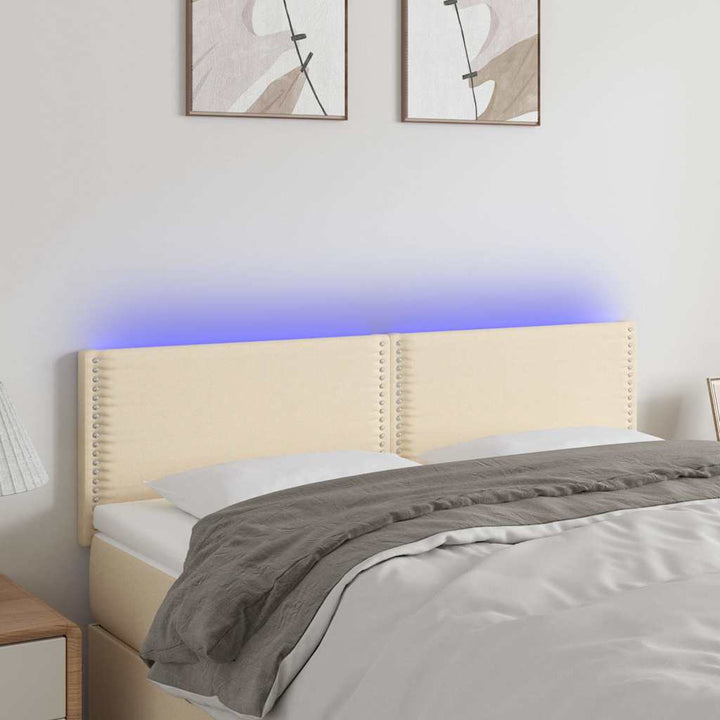 sengegavl med LED-lys 144x5x78/88 cm stof cremefarvet