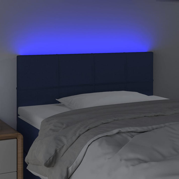 sengegavl med LED-lys 100x5x78/88 cm stof blå