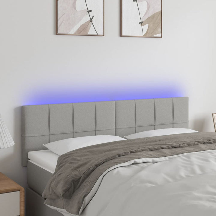 sengegavl med LED-lys 144x5x78/88 cm stof lysegrå