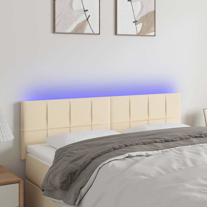 sengegavl med LED-lys 144x5x78/88 cm stof cremefarvet