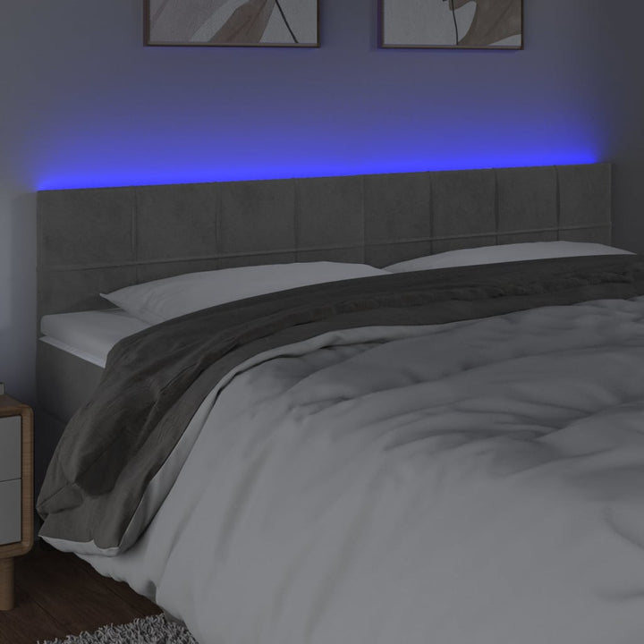 sengegavl med LED-lys 160x5x78/88 cm fløjl lysegrå