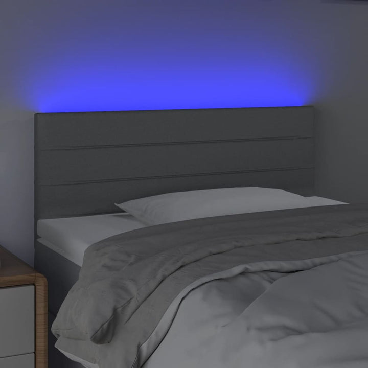 sengegavl med LED-lys 80x5x78/88 cm stof lysegrå