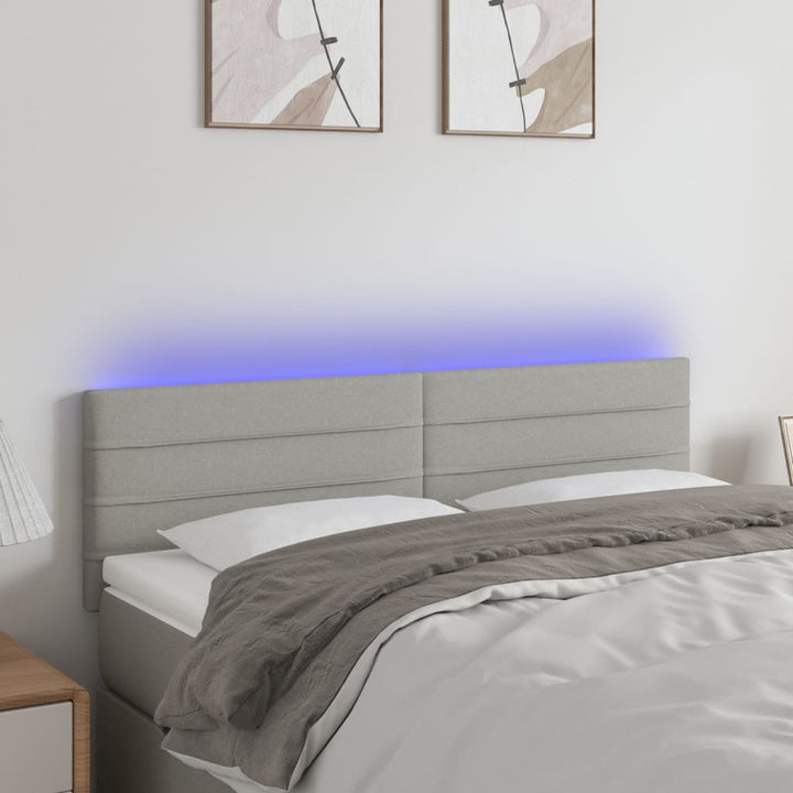 sengegavl med LED-lys 144x5x78/88 cm stof lysegrå