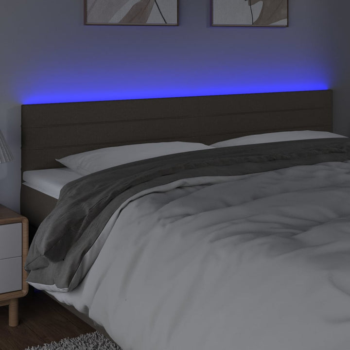 sengegavl med LED-lys 180x5x78/88 cm stof gråbrun