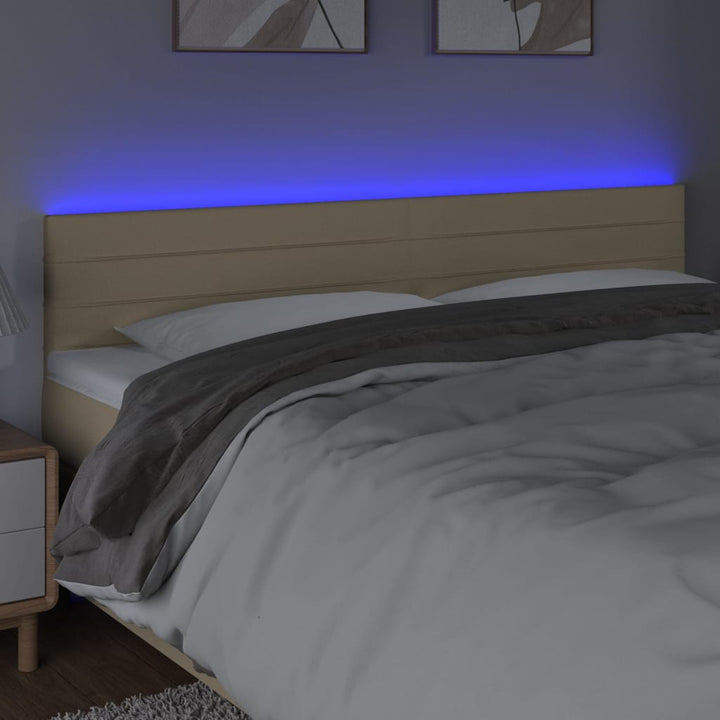 sengegavl med LED-lys 180x5x78/88 cm stof cremefarvet