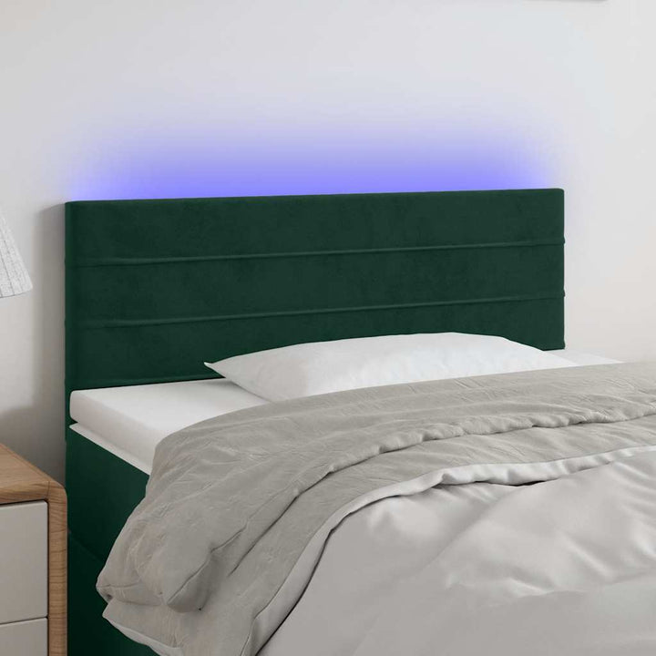 sengegavl med LED-lys 100x5x78/88 cm fløjl mørkegrøn