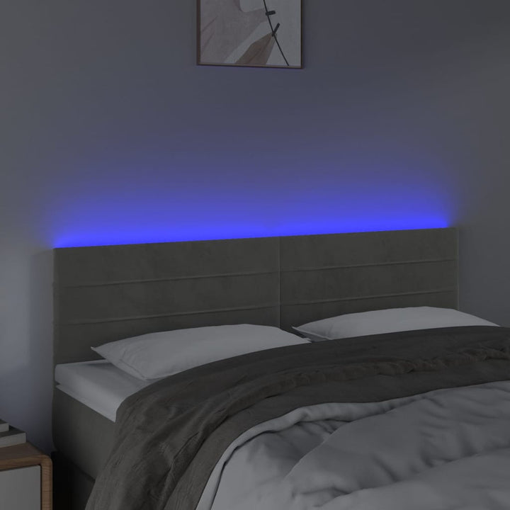 sengegavl med LED-lys 144x5x78/88 cm fløjl lysegrå