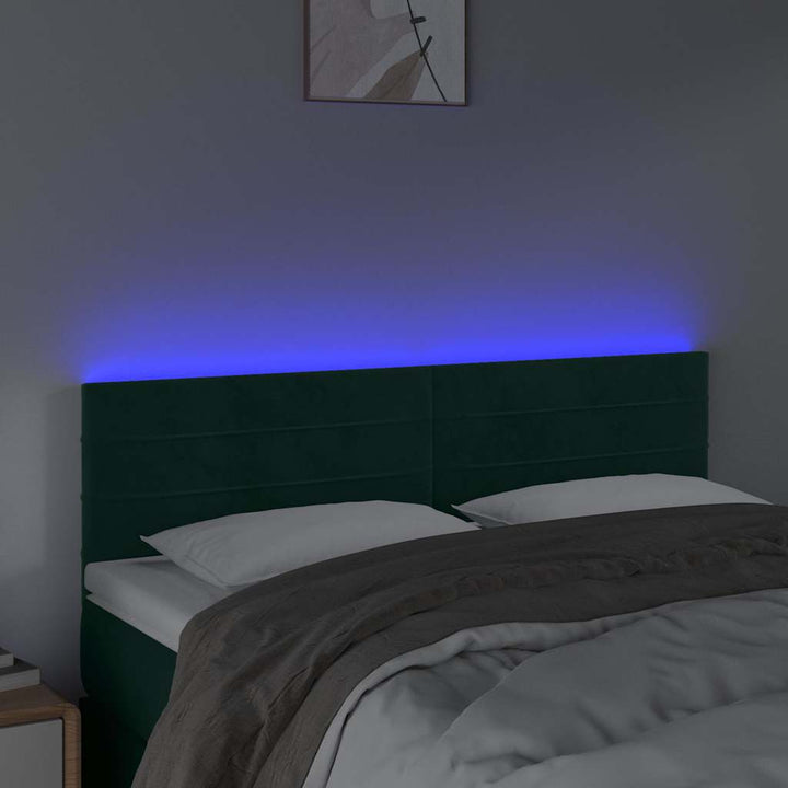 sengegavl med LED-lys 144x5x78/88 cm fløjl mørkegrøn