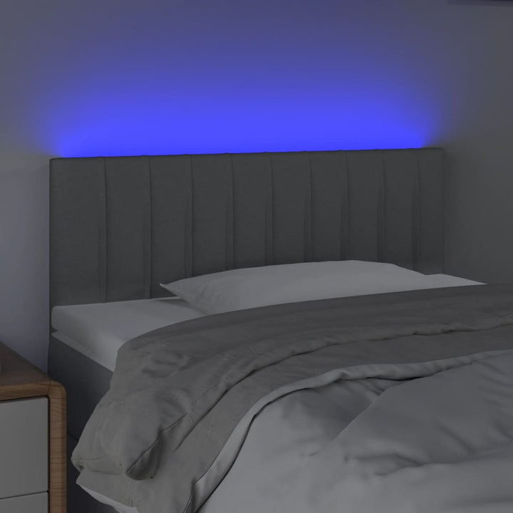 sengegavl med LED-lys 100x5x78/88 cm stof lysegrå