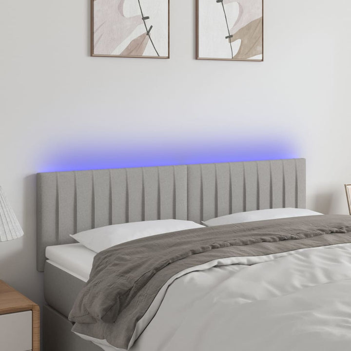sengegavl med LED-lys 144x5x78/88 cm stof lysegrå