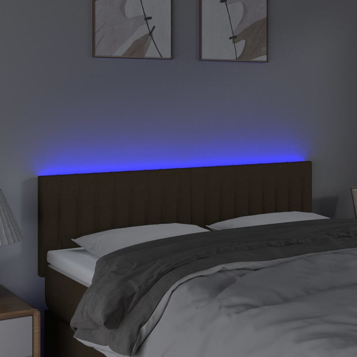 sengegavl med LED-lys 144x5x78/88 cm stof mørkebrun
