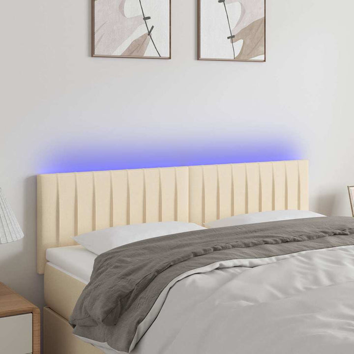 sengegavl med LED-lys 144x5x78/88 cm stof cremefarvet