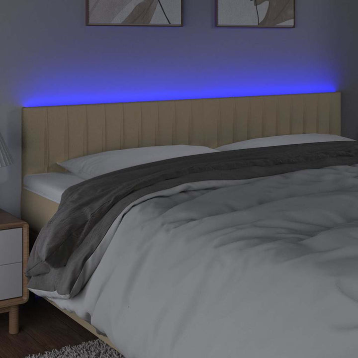 sengegavl med LED-lys 180x5x78/88 cm stof cremefarvet
