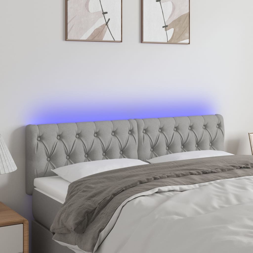 sengegavl med LED-lys 160x7x78/88 cm stof lysegrå