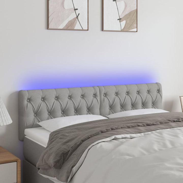 sengegavl med LED-lys 160x7x78/88 cm stof lysegrå