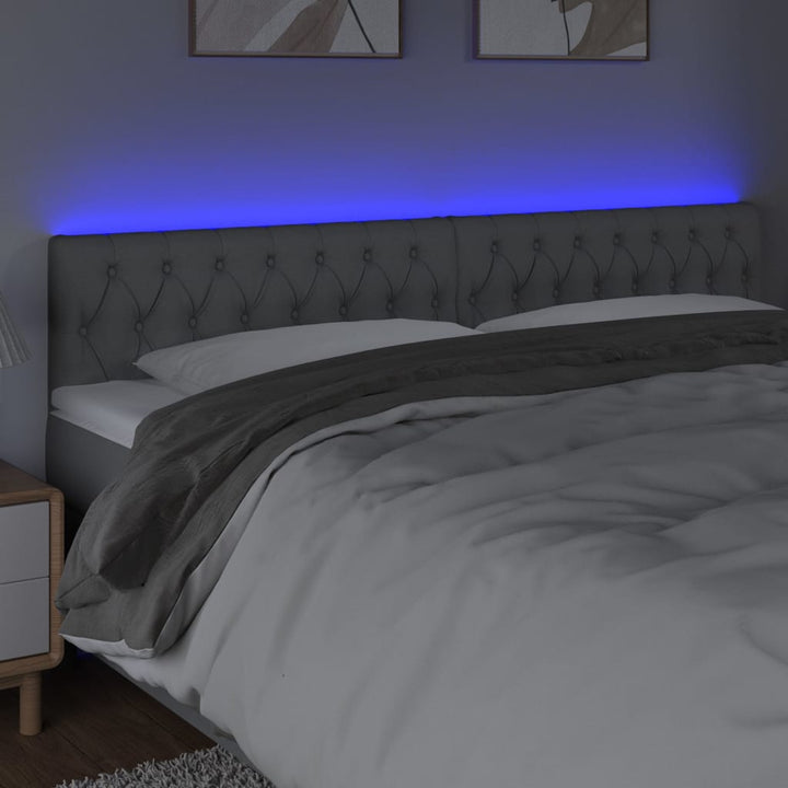 sengegavl med LED-lys 200x7x78/88 cm stof lysegrå