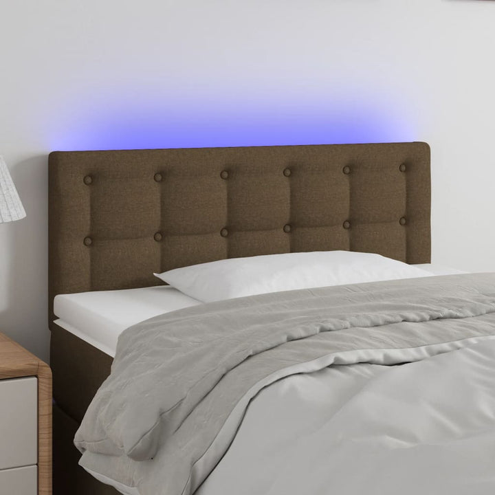 sengegavl med LED-lys 80x5x78/88 cm stof mørkebrun