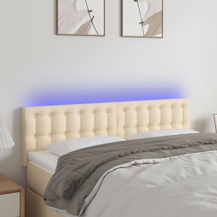 sengegavl med LED-lys 144x5x78/88 cm stof cremefarvet