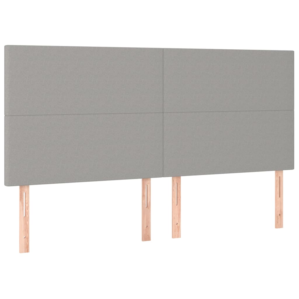 sengegavl med LED-lys 160x5x118/128 cm stof lysegrå