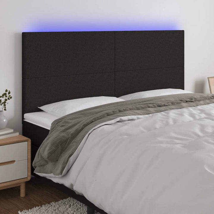 sengegavl med LED-lys 160x5x118/128 cm stof sort