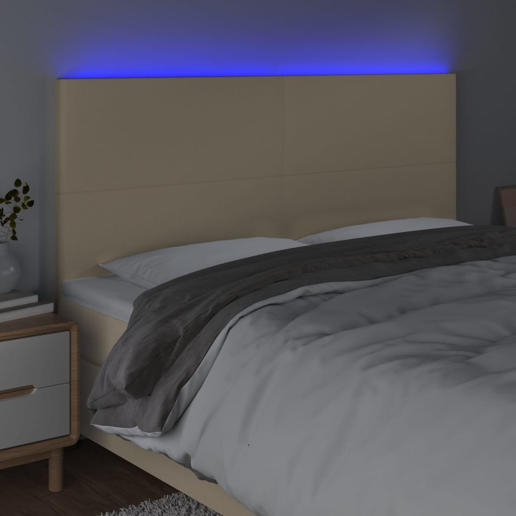 sengegavl med LED-lys 160x5x118/128 cm stof cremefarvet