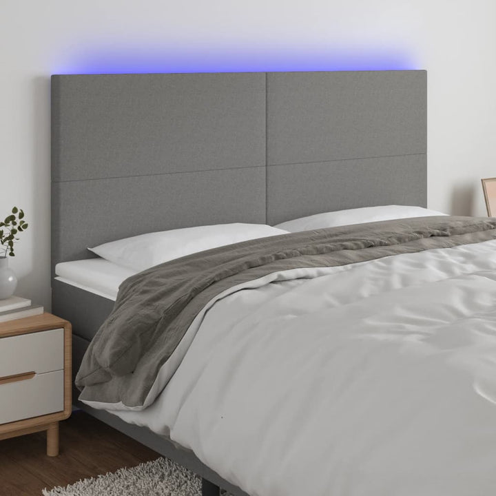 sengegavl med LED-lys 200x5x118/128 cm stof mørkegrå