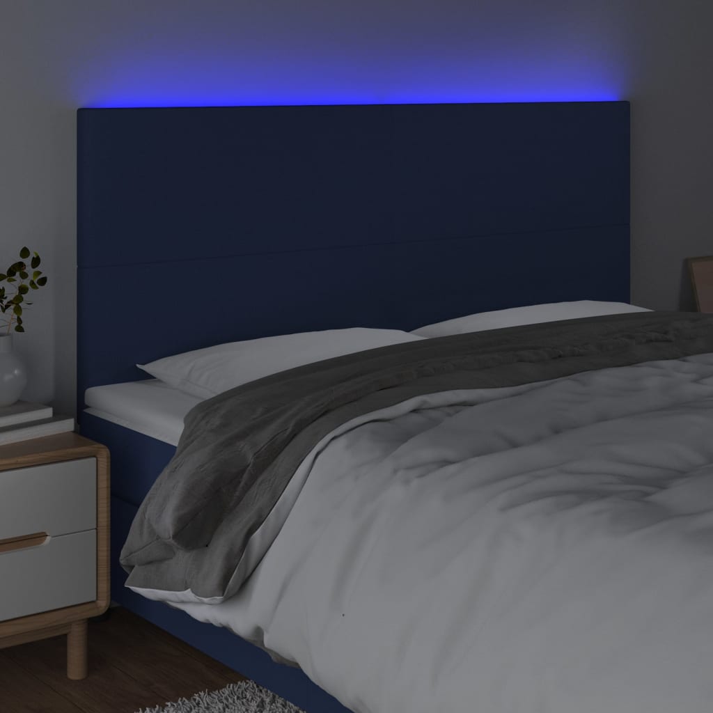 sengegavl med LED-lys 200x5x118/128 cm stof blå