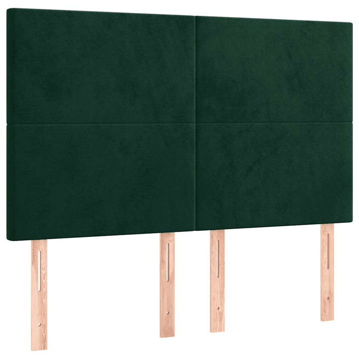 sengegavl med LED-lys 144x5x118/128 cm fløjl mørkegrøn
