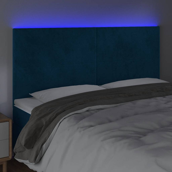 sengegavl med LED-lys 160x5x118/128 cm fløjl mørkeblå