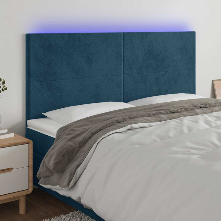 sengegavl med LED-lys 160x5x118/128 cm fløjl mørkeblå