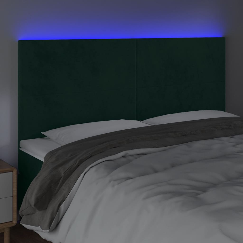 sengegavl med LED-lys 180x5x118/128 cm fløjl mørkegrøn