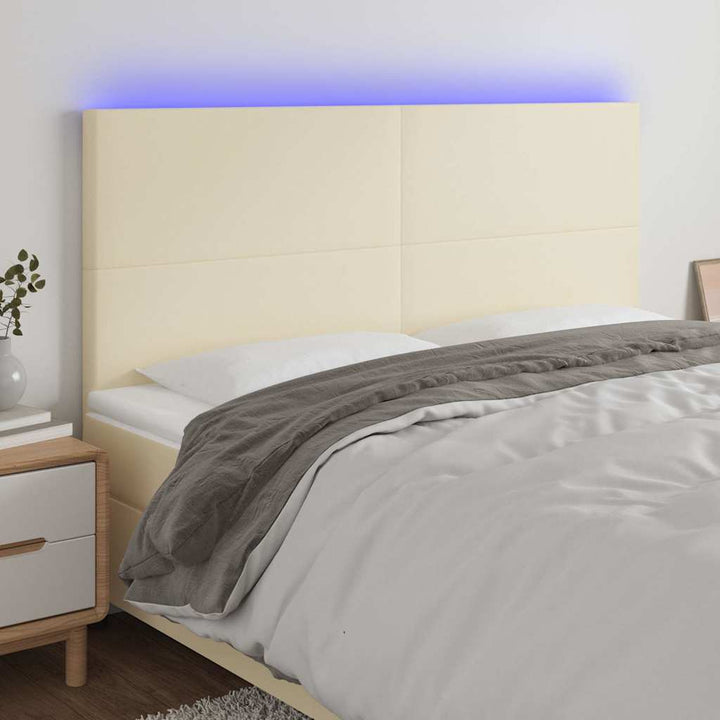 sengegavl med LED-lys 200x5x118/128 cm kunstlæder cremefarvet