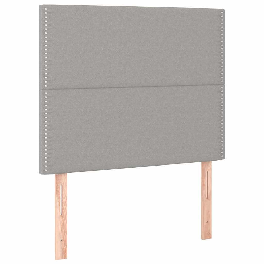 sengegavl med LED-lys 100x5x118/128 cm stof lysegrå