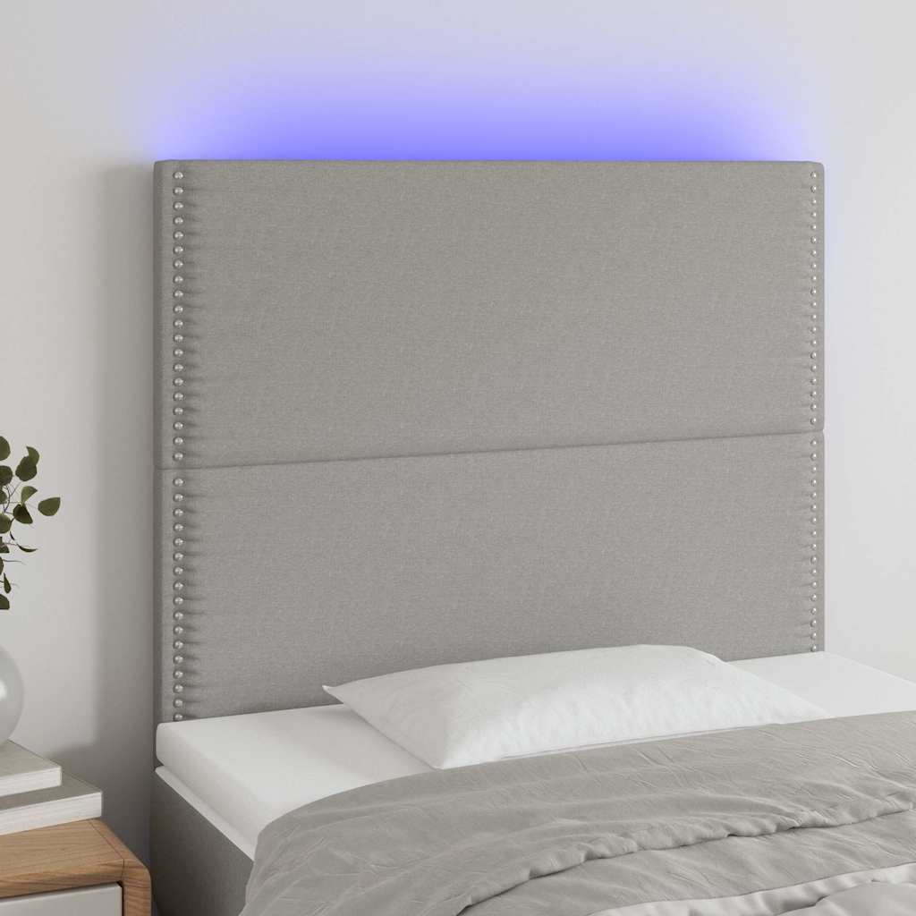 sengegavl med LED-lys 100x5x118/128 cm stof lysegrå