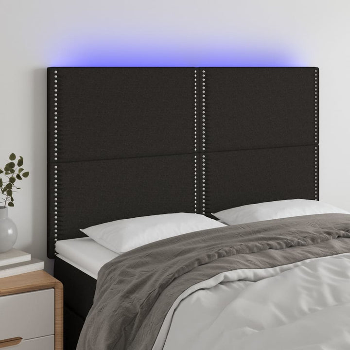 sengegavl med LED-lys 144x5x118/128 cm stof sort