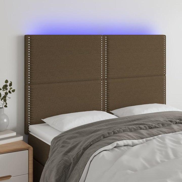 sengegavl med LED-lys 144x5x118/128 cm stof mørkebrun
