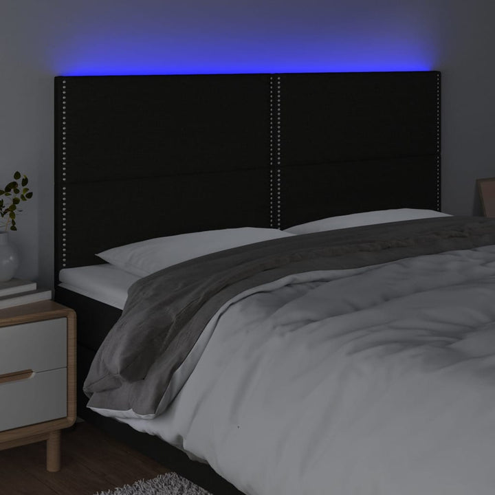 sengegavl med LED-lys 160x5x118/128 cm stof sort